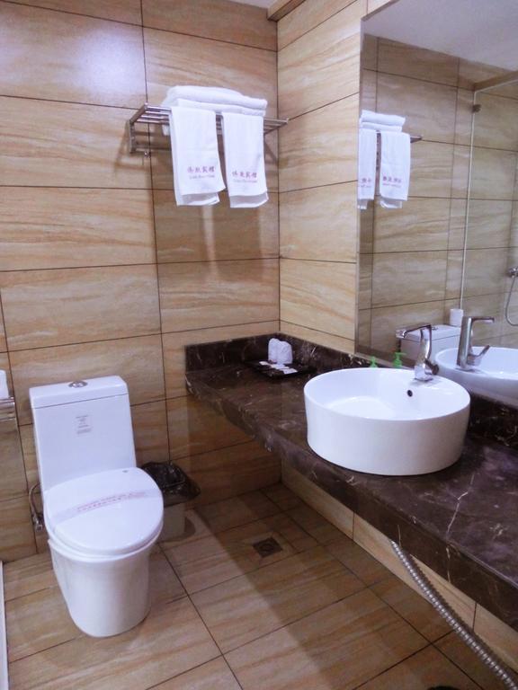 Guangdong Oversea Chinese Hotel Γκουανγκζού Δωμάτιο φωτογραφία